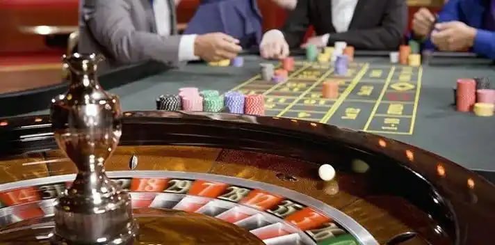 Filipino player using 50 Bet platform on a mobile phone for sports betting